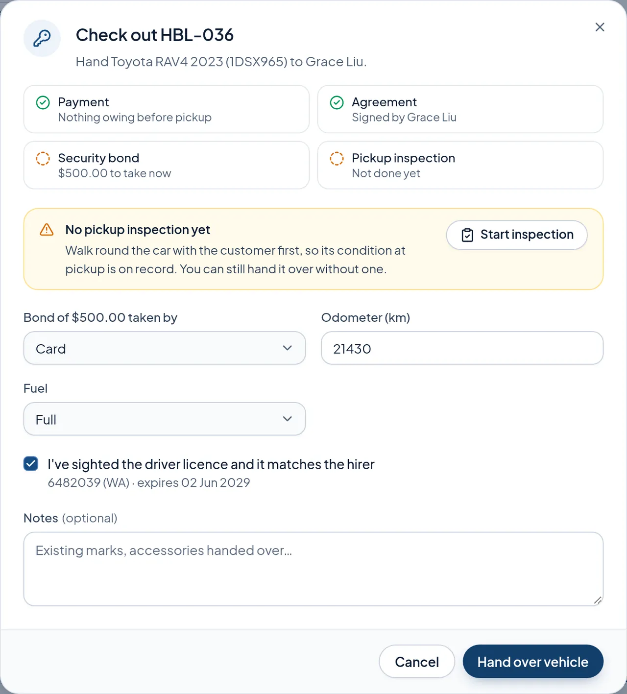 The check-out dialog: payment, agreement, bond and pickup inspection status, bond method, odometer, fuel and a licence check.
